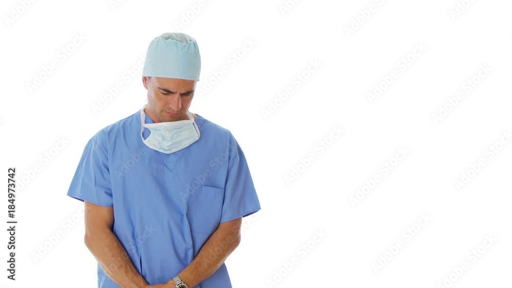 Unhappy surgeon delivering bad news Unhappy surgeon delivering bad news