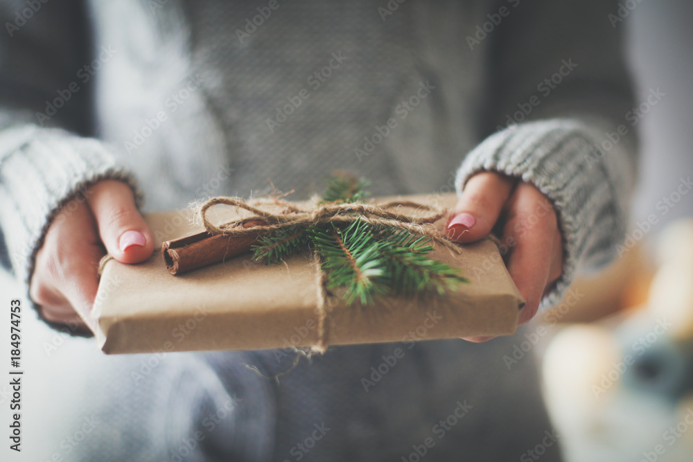 Hands of woman holding christmas gift box. Christmas