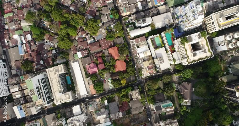 BANGKOK, THAILAND, MARCH 2017: Aerial view over housing area in Central Bangkok, mid day BANGKOK, THAILAND, MARCH 2017: Aerial view over housing area in Central Bangkok, mid day