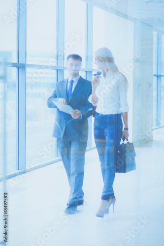 Smiling successful business team standing in office . business © lenets_tan