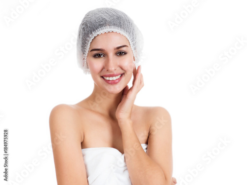 Beauty Spa Woman with perfect skin Portrait. Beautiful Brunette Spa Girl showing empty copy space on the open hand palm for