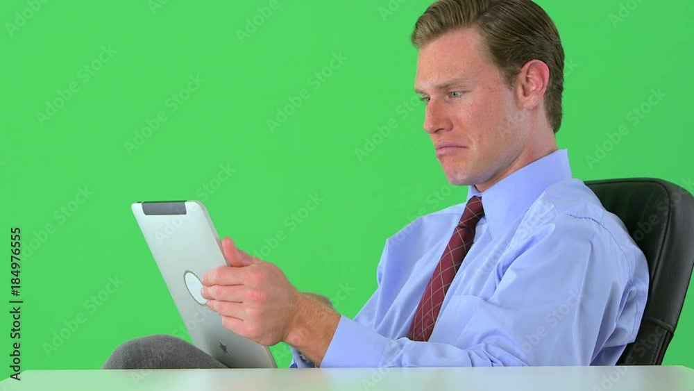 businessman writing notes and researching on tablet businessman writing notes and researching on tablet