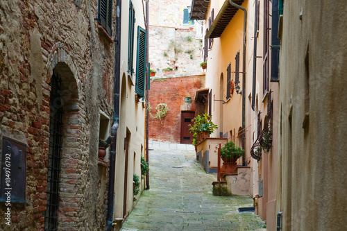 Montepuliciano old city characteristic medieval narrow street, Tuscany, Italy
