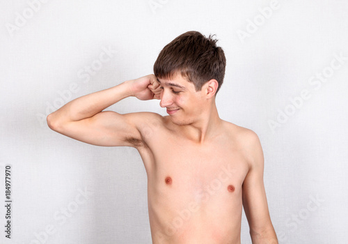 Young Man Muscle Flexing