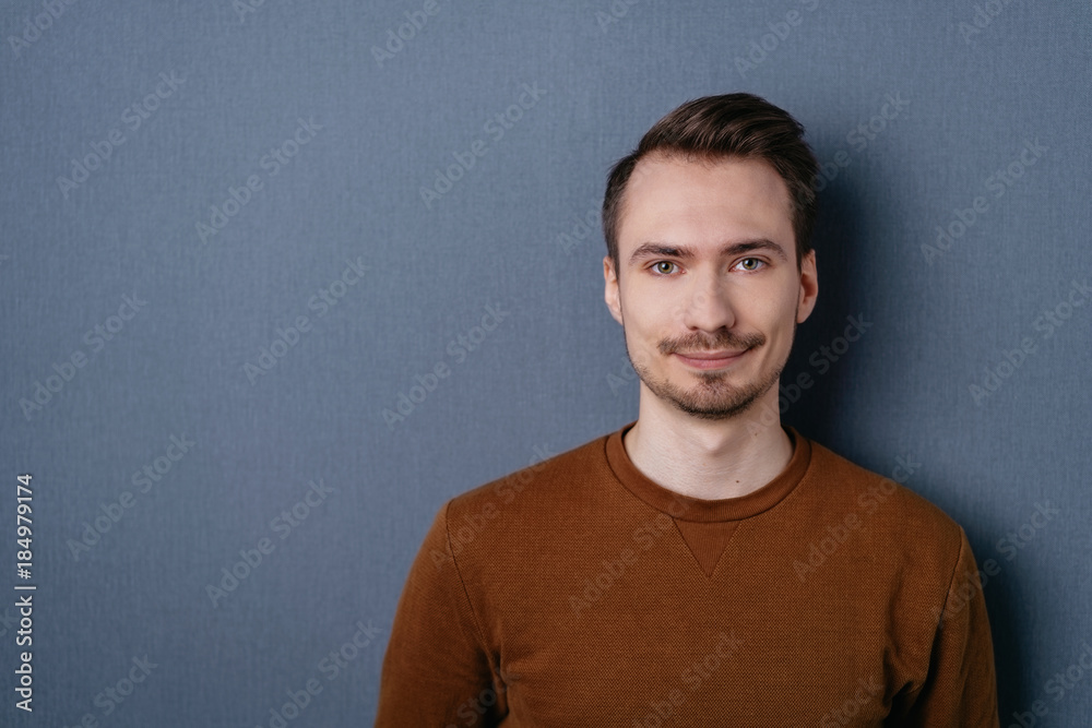 Attractive young man with a friendly smile Attractive young man with a friendly smile