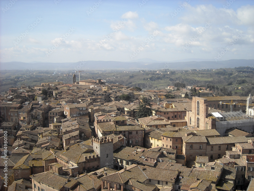 Scenery of Siena, a beautiful medieval town in Tuscany, with view of the Dome & Bell Tower of Siena Cathedral (Duomo di Siena)