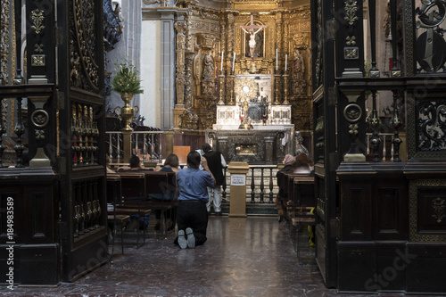 Pilgrims at Guadalupe Cathedral in Mexico City,  Basilica houses original cloak with the image of Our Lady of Guadalupe visited by million people every year expecially in December. photo