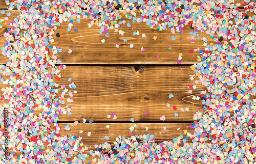 confetti on a wooden background