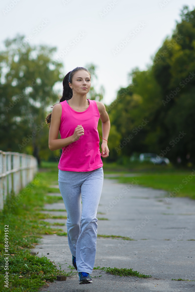 Female running athlete. Woman runner sprinting for healthy lifestyle