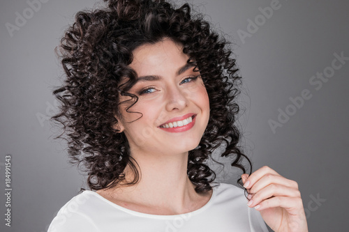 Beautiful woman with curly hair