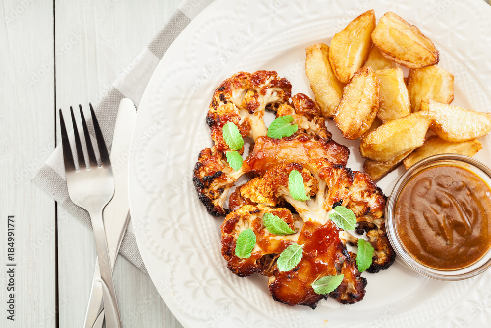 Vegetarian roasted cauliflower steak with herbs Vegetarian roasted cauliflower steak with herbs