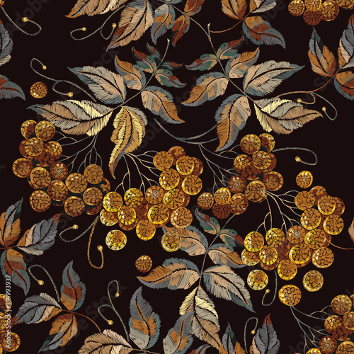 Embroidery red branches of a mountain ash berry vintage style. Fashionable template for design of clothes. Classical embroidery red berries of mountain ash art pattern