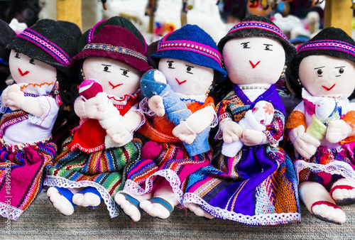 Row of rag dolls in traditional clothes, Otavalo Market, Ecuador
 photo