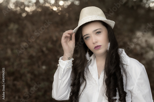 Portrait of young woman with a hat. © Eduardo Estellez