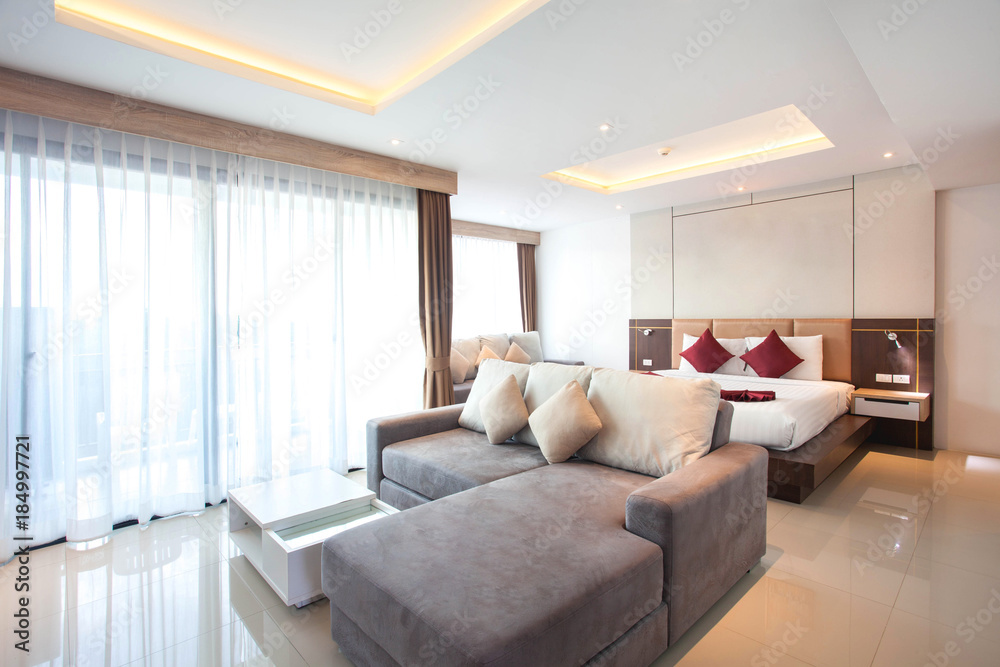 Fototapeta premium Luxury Interior design in bedroom of pool villa with cozy king bed