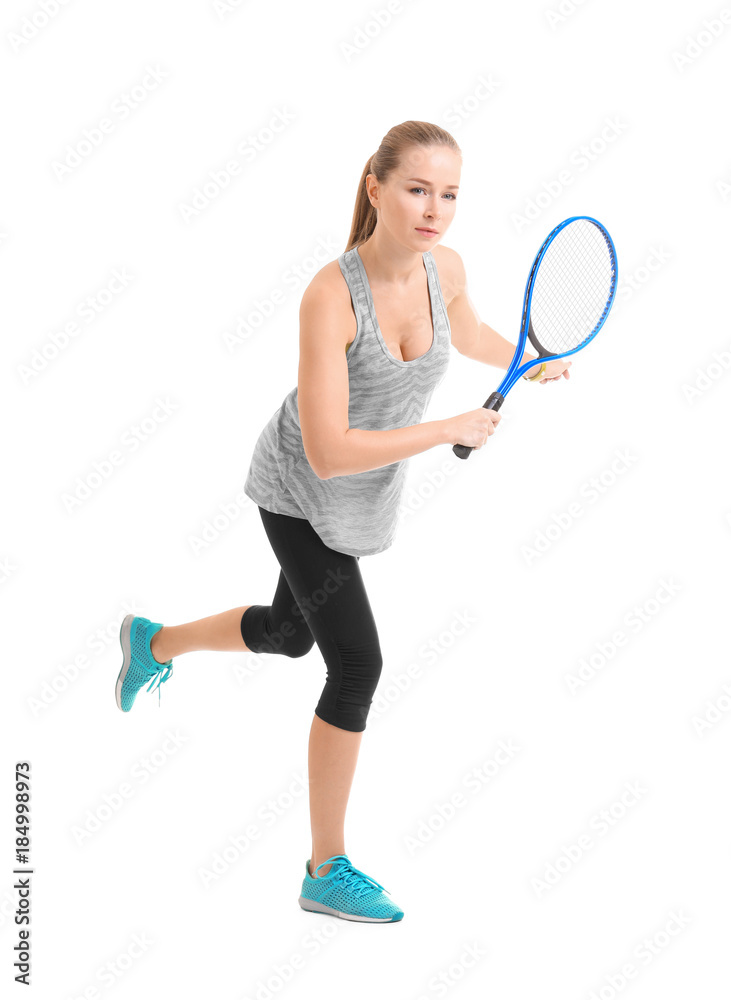Young woman playing tennis on white background