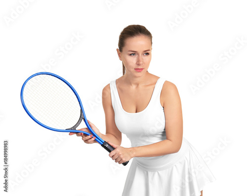 Young woman with tennis racket on white background