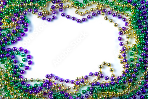 Mardi gras carnival background - beads and mask