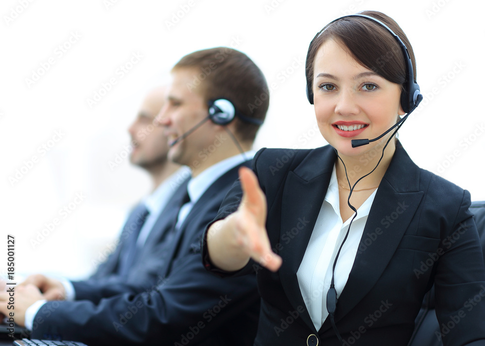 Manager of call center reaches out to shake hands. Manager of call center reaches out to shake hands.