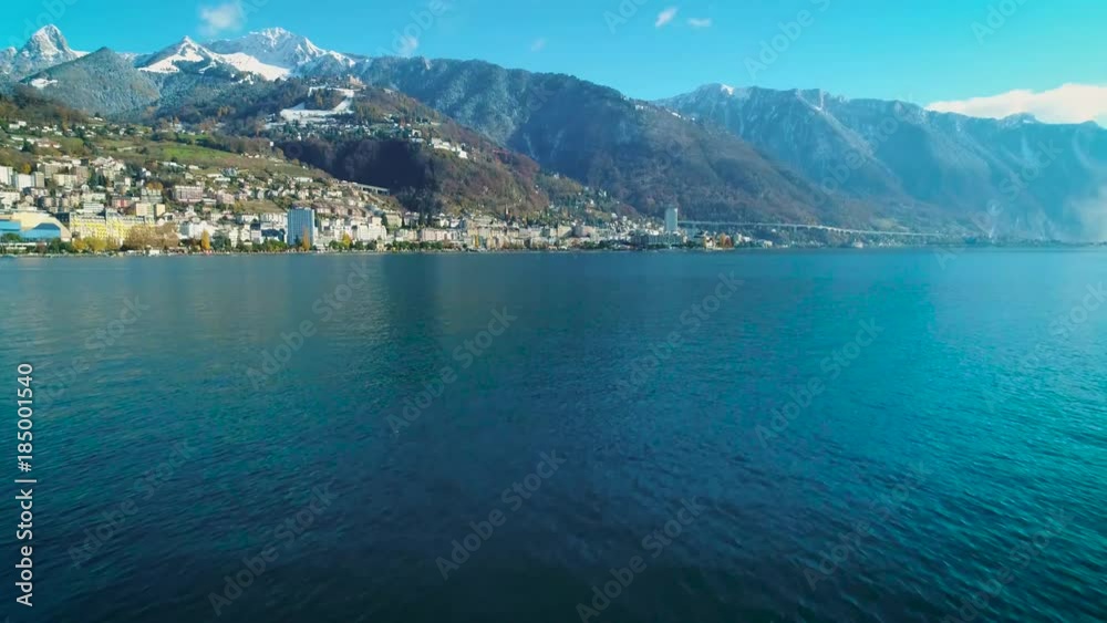 4K 50P (HFR) aerial of famous city of Montreux, east looking over water 4K 50P (HFR) aerial of famous city of Montreux, east looking over water