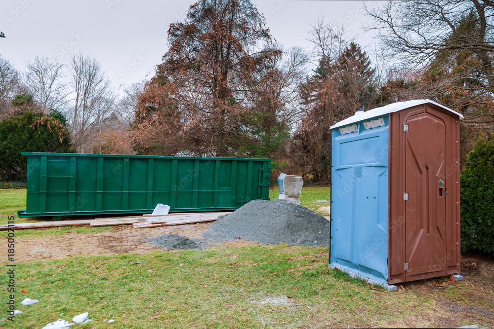 Over flowing Dumpsters being full with garbage