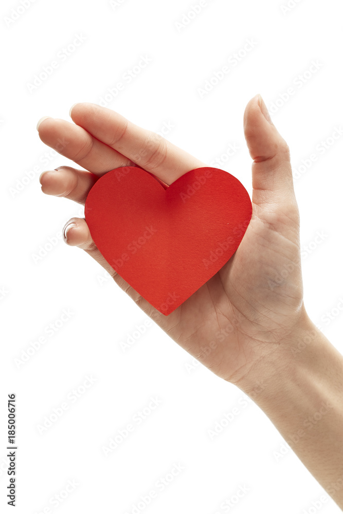 red paper heart in hand isolated on white