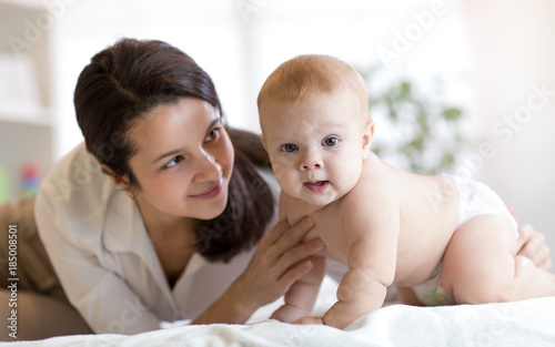 Mom and her little son wear...