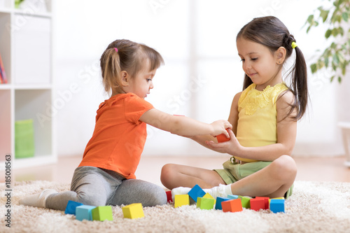 Cute children playing while...