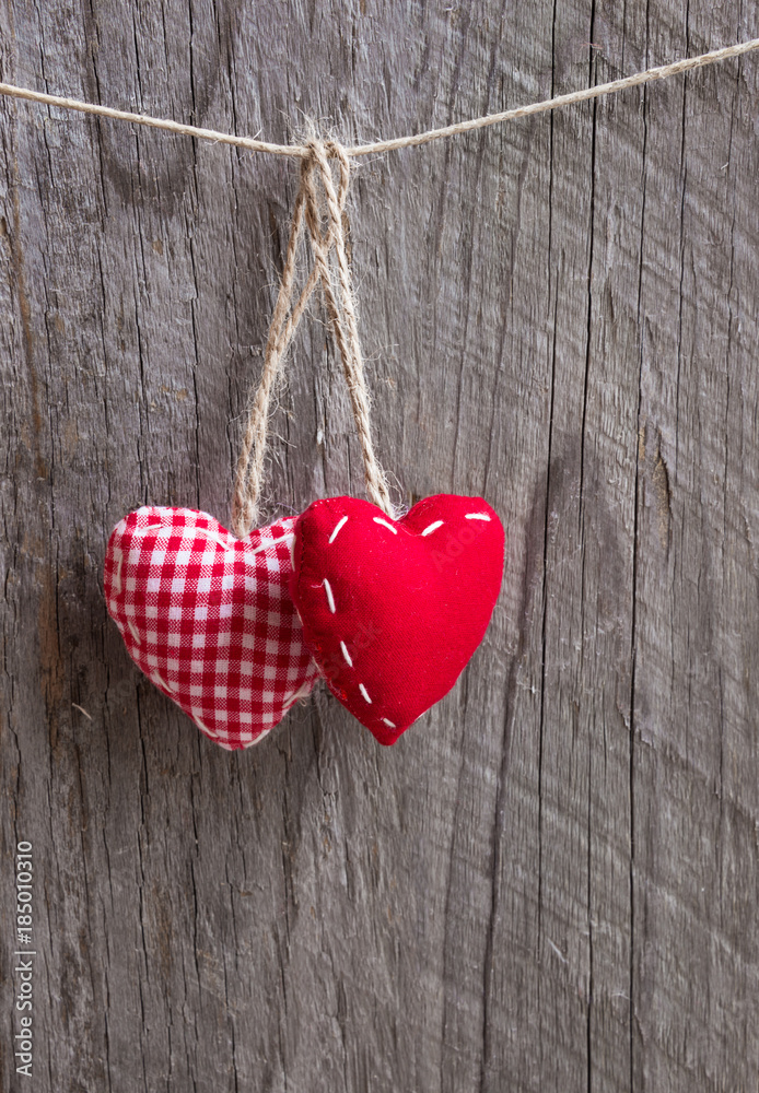 Two hearts on wooden surface Two hearts on wooden surface