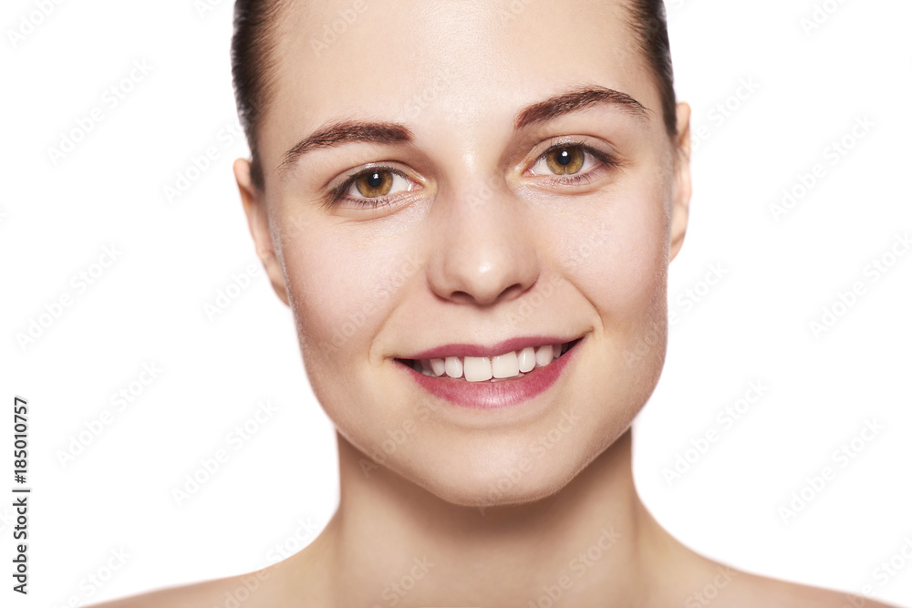 Beautiful Young Woman with Clean Fresh Skin isolated on white background Beautiful Young Woman with Clean Fresh Skin isolated on white background