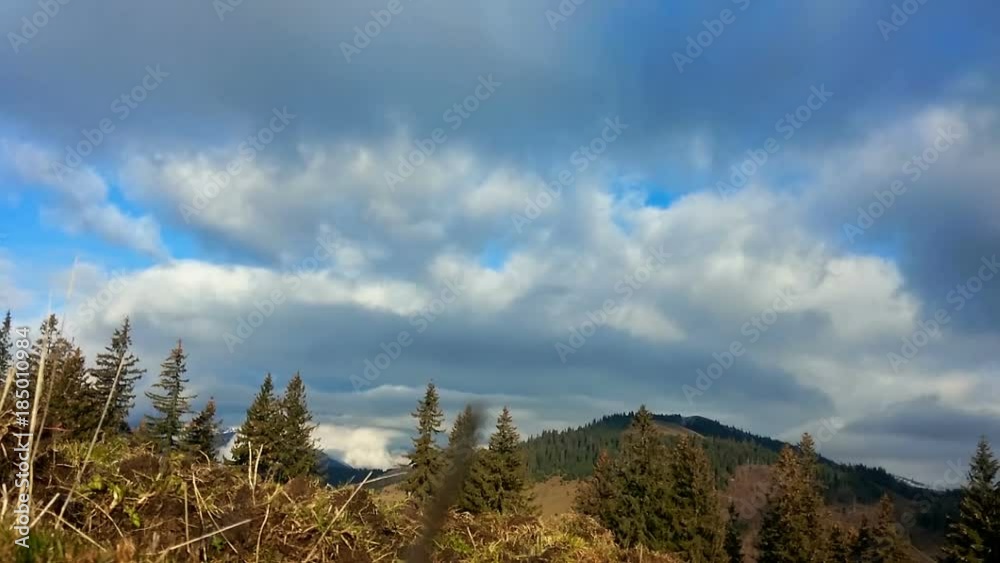 Beautiful timelapse clouds over mountain ridge, autumn Beautiful timelapse clouds over mountain ridge, autumn