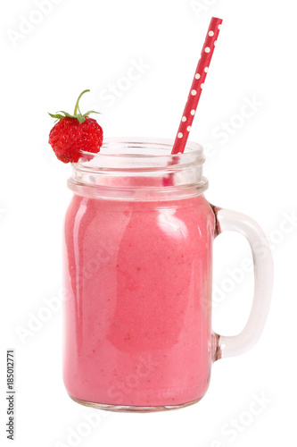 Glass of strawberry yogurt or smoothie with mint leaves isolated on white background © kolesnikovserg