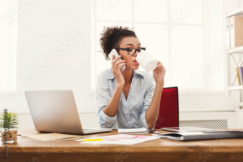 Business talk, woman consulting by phone at office