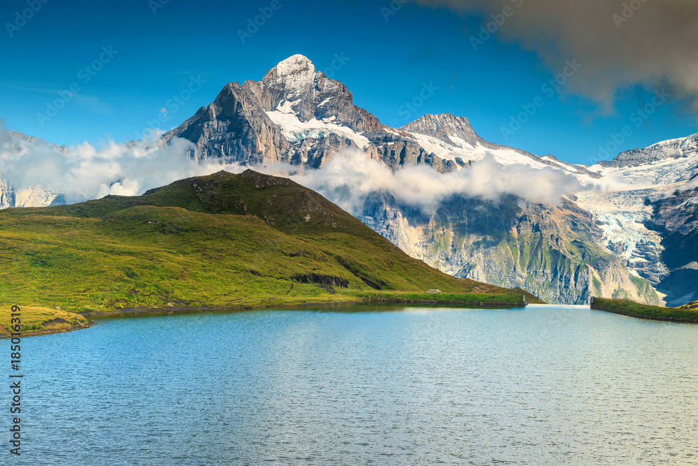 Majestic alpine lake Bachalpsee, Grindelwald, Switzerland, Europe