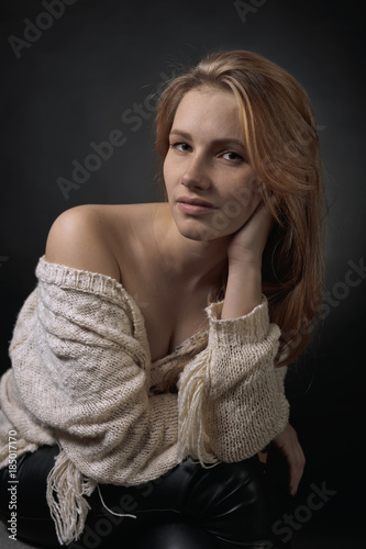 Woman with long curly hair .