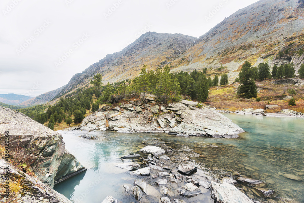 View of the lake Kuiguk in Altai Mountains. Autumn landscape View of the lake Kuiguk in Altai Mountains. Autumn landscape