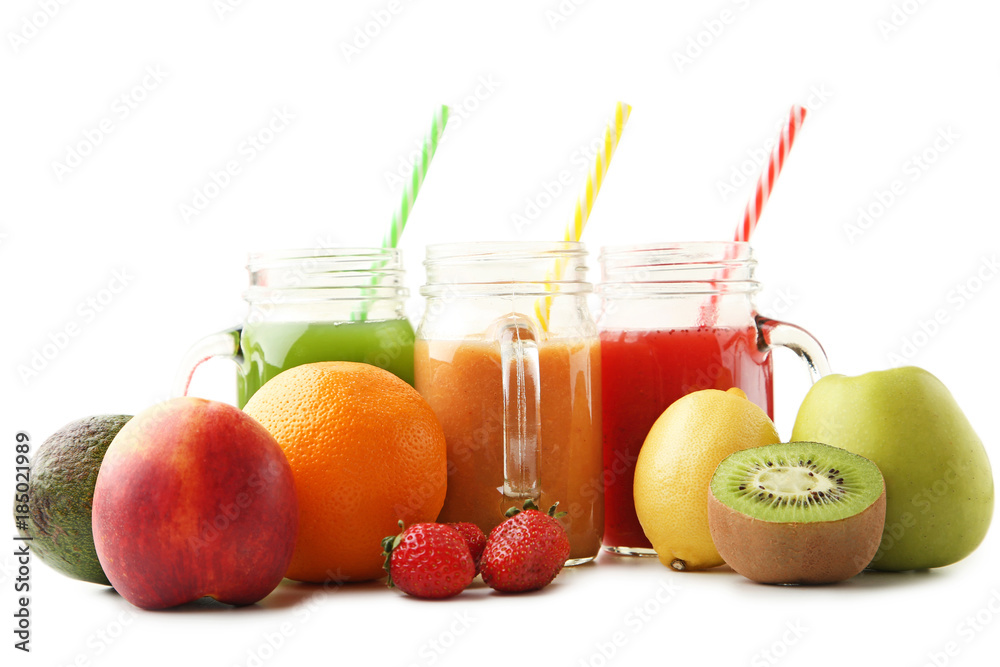 Sweet smoothie in glass jars with fruits on white background Sweet smoothie in glass jars with fruits on white background