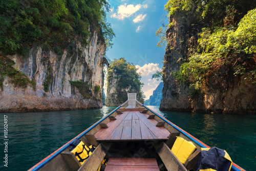 Longtail boat trip in Cheow Lan Lake, Khao Sok National Park, Surat Thani Province, Thailand.