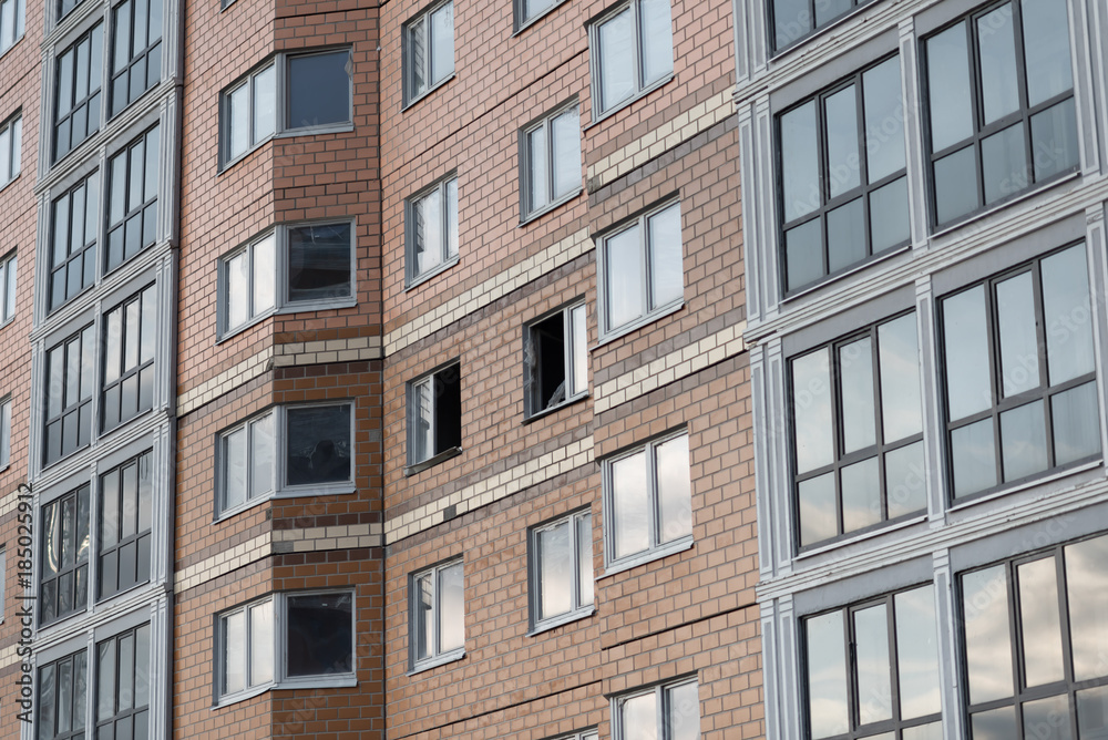 broken glass in modern appartment building. Crisis. flats are not sold and are empty broken glass in modern appartment building. Crisis. flats are not sold and are empty