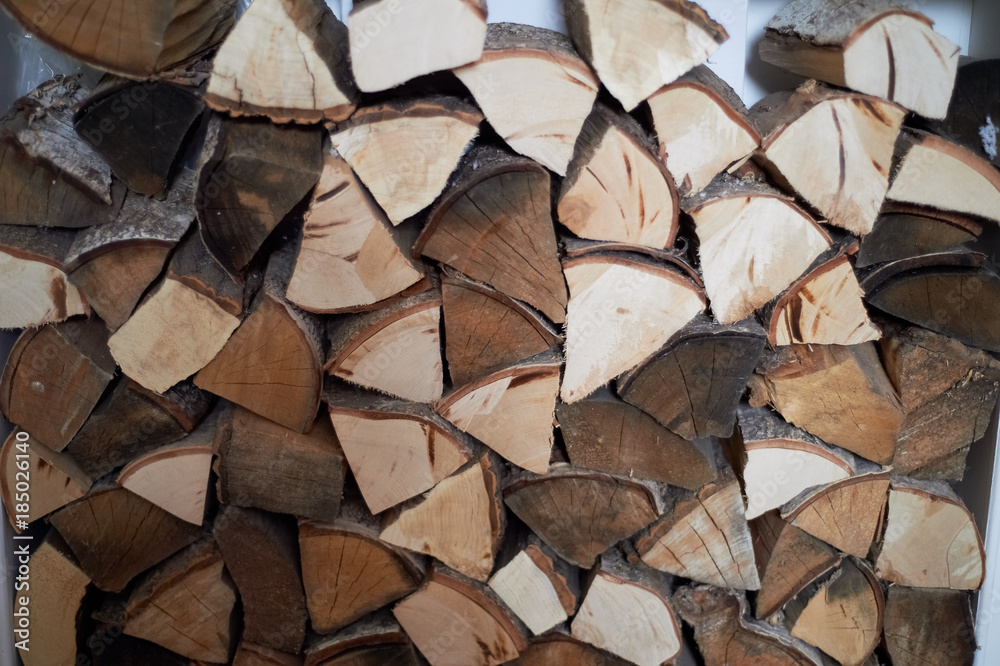 Pollenize of firewood close. The texture of the split wood