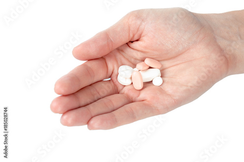 pills in woman hand