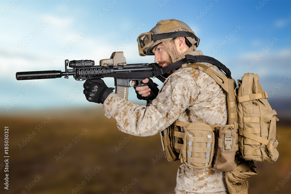 Fototapeta premium Modern soldier with rifle