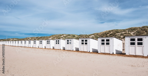 bathhouses in a row on the beach