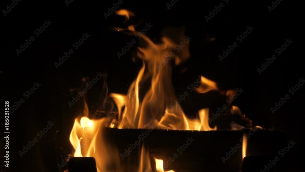 Fire in fireplace - close up slow motion Fire in fireplace - close up slow motion