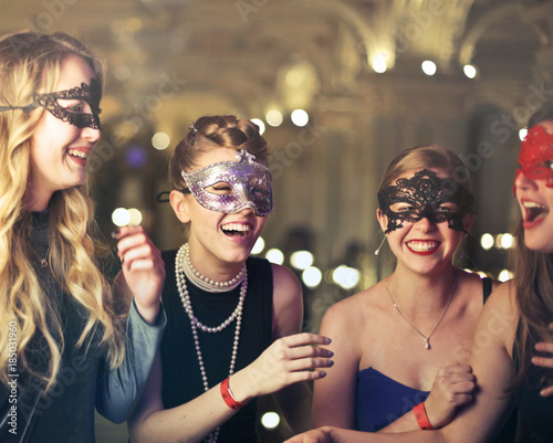 Group of masked girls laughing