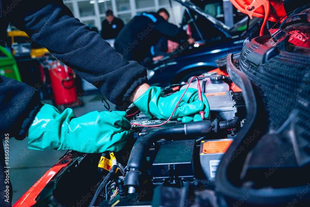 Electic car with open hood. Details of electric car engine. Electic car with open hood. Details of electric car engine.