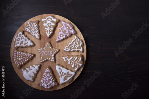 Circle with ginger biscuits in the form of fir trees