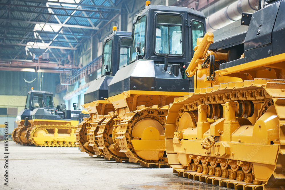 Fototapeta premium bulldozer in assembly shop in factory