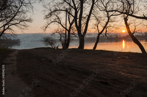 winter sunset on beach in Hungary  calm country side river sunset