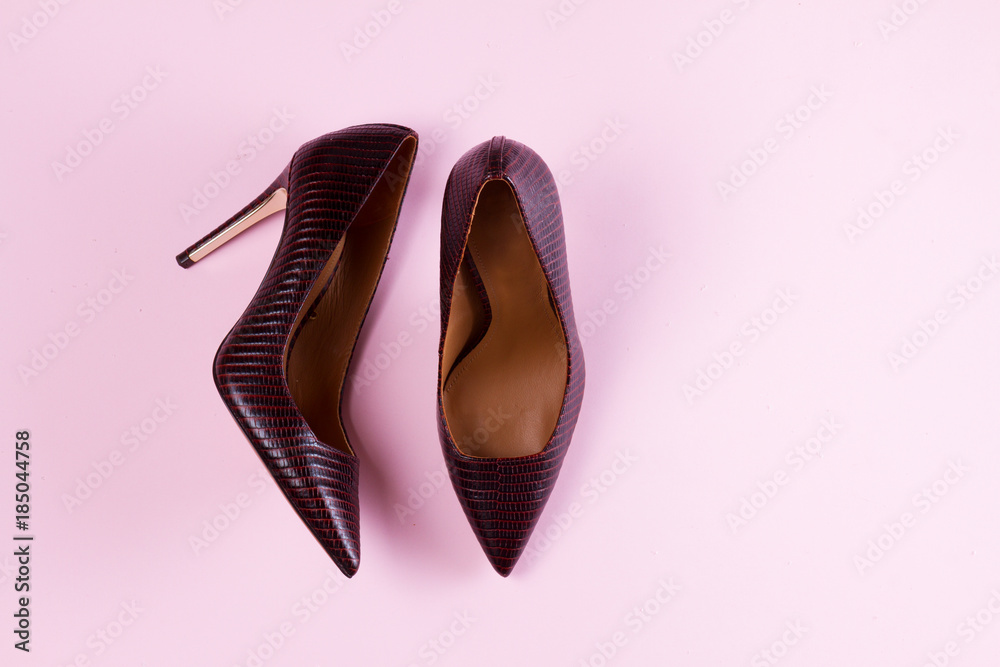 Pair of Elegant high heel shoes on pink background Pair of Elegant high heel shoes on pink background